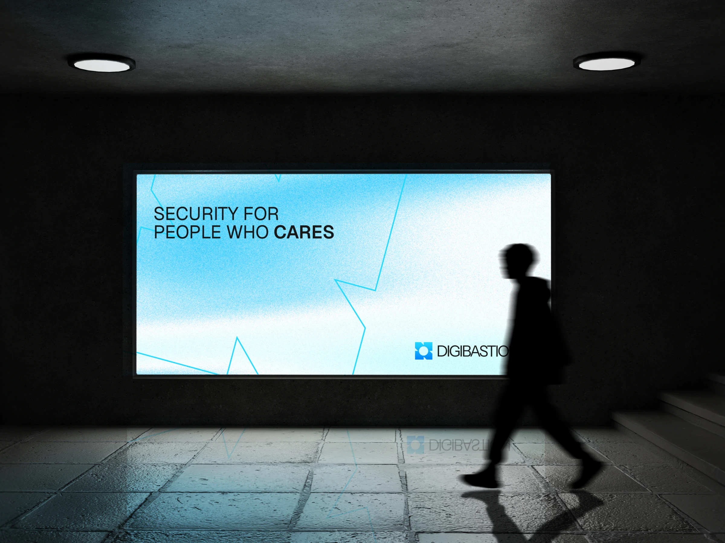 A person walking past a lit Digibastion billboard about security for people who care