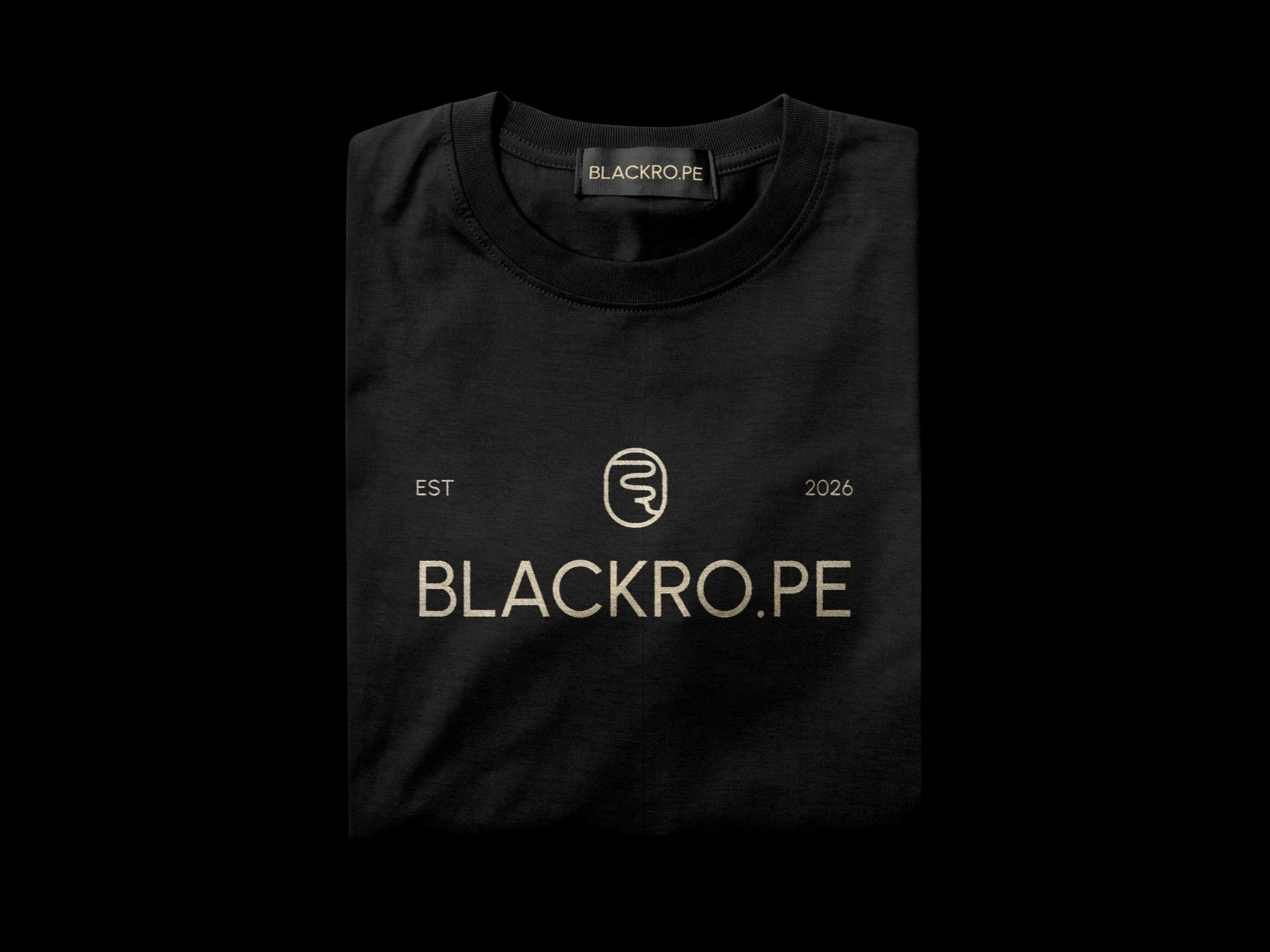 A folded black T-shirt with the rope mark and BLACKRO.PE in gold