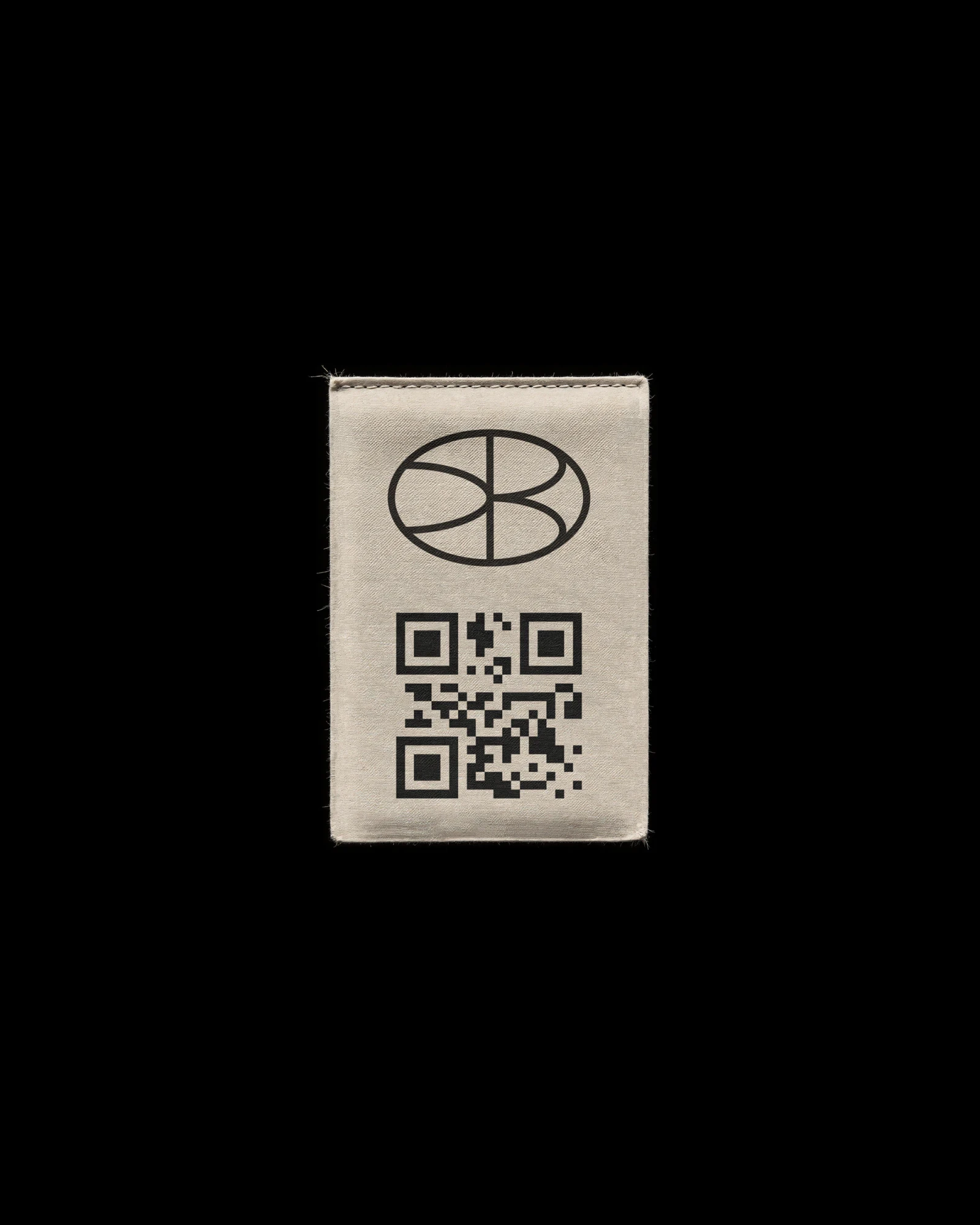 A cream card with the seal and a QR code on black